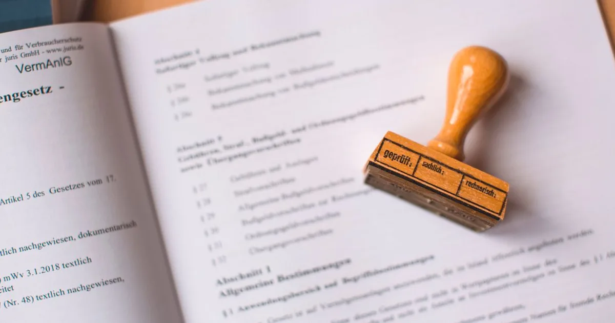Official document with a verification stamp — stand-in for CFPM credential paper
