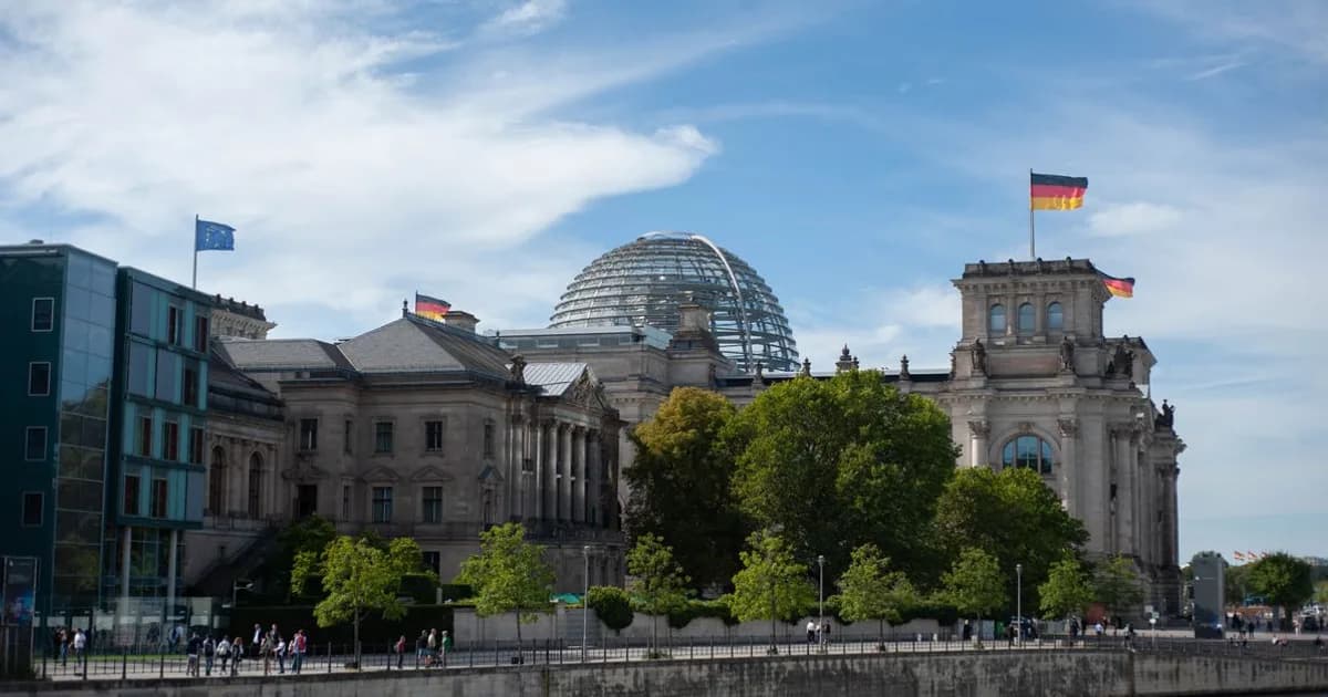 Berlin Reichstag and Spree River under clear sky