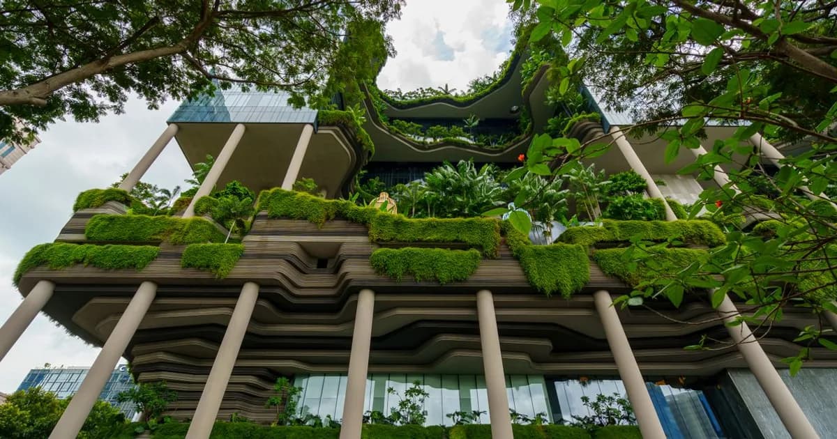 Modern green building with plants and glass facade for LEED certification