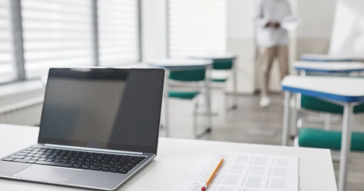 Person taking a computer-based citizenship practice test at a desk