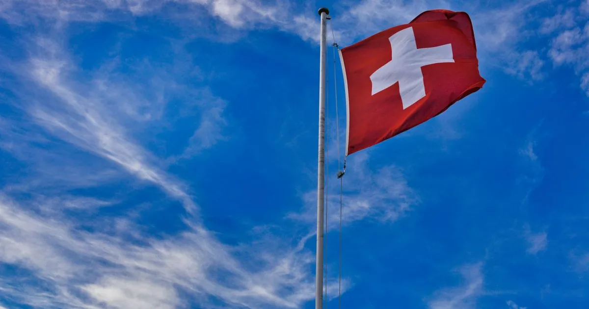 Swiss flag with white cross on a red field